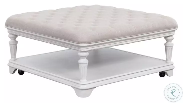 Avalon Furniture O00162-C11 West Chester Light Gray Oak and Distressed White Upholstered Castered Cocktail Table Avalon Furniture O00162-C11 West Chester Light Gray Oak and Distressed White Upholstered Castered Cocktail Table